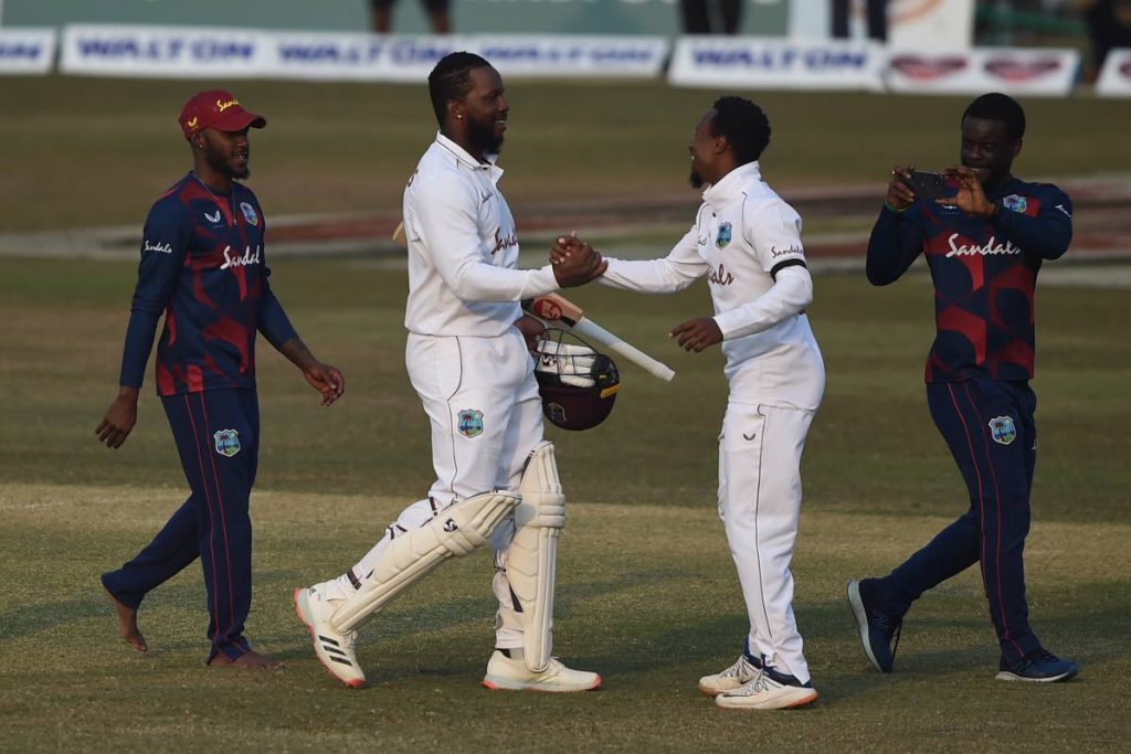 West Indies batsman Kyle Mayers, second from left, is congratulated by teammates after his double century helped win the first Test against Bangladesh at the Zohur Ahmed Chowdhury Stadium in Chittagong on Sunday. - AFP