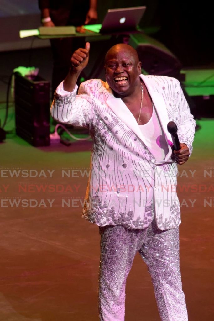 Soca artiste Blaxx smiles during a performance at his concert, Harmony 3, at Queen's Hall in February 2021.