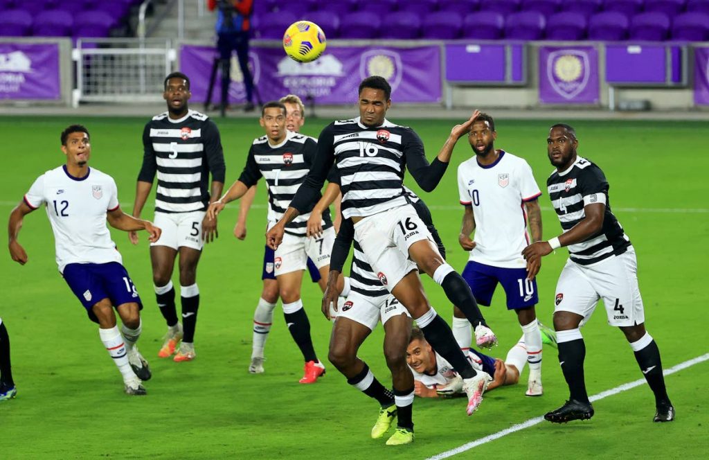 In this Jan 31, file photo, TT’s Alvin Jones(16) heads the ball during a friendly against the the United States at 
Exploria 
Stadium, in 
Orlando, 
Florida.
 - (AFP PHOTO)