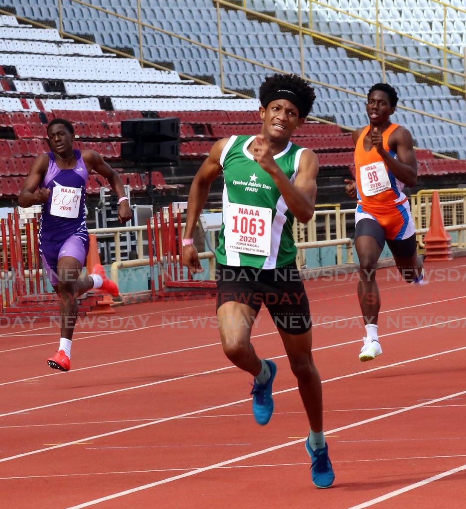 Joshua Maxwell of Fyzabad Athletic Stars takes first place in the Boys U-20 400m finals on Sunday. PHOTO BY SUREASH CHOLAI - 