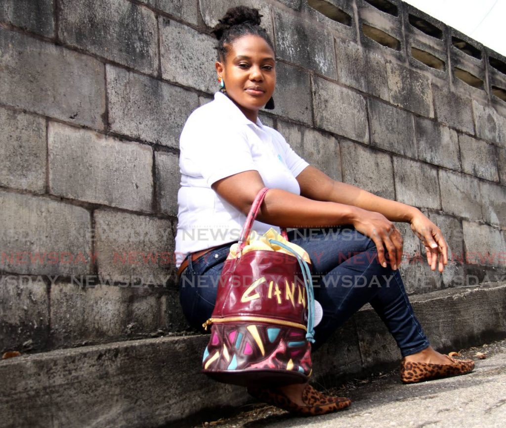 Danielle Benskin with one of her leather bags in the D Benskin Design House brand. Photo by Ayanna Kinsale - 