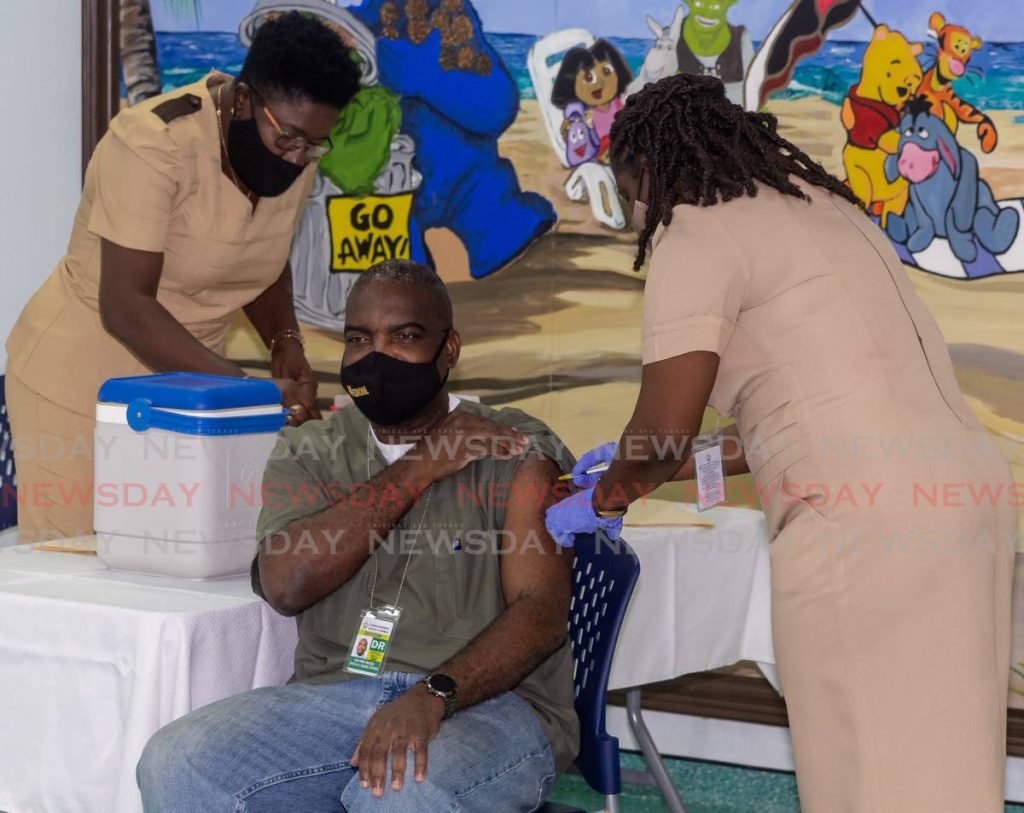 Dr Ogonna Okeke receives the first of two doses of covid19 vaccine at Scarborough General Hospital on February 20. One thousand health workers world have received the first doses of 2,000 vaccines donated by Barbados as of Saturday (February 28), according to Health Minister Terrance Deyalsingh.  - 