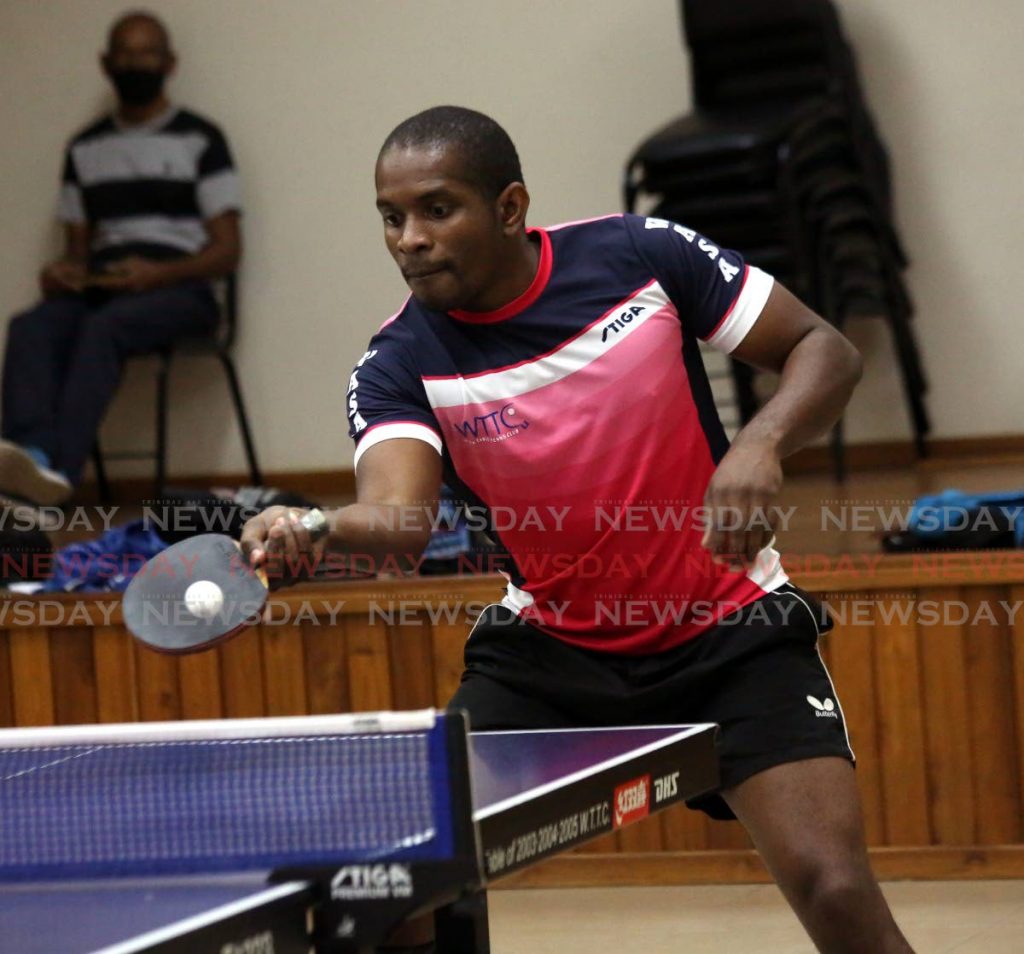 WASA's Curtis Humphreys in action against Hillview Renegades in the Table Tennis Champions League on Thursday at the D'Abadie Community Centre. PHOTOS BY SUREASH CHOLAI  - 