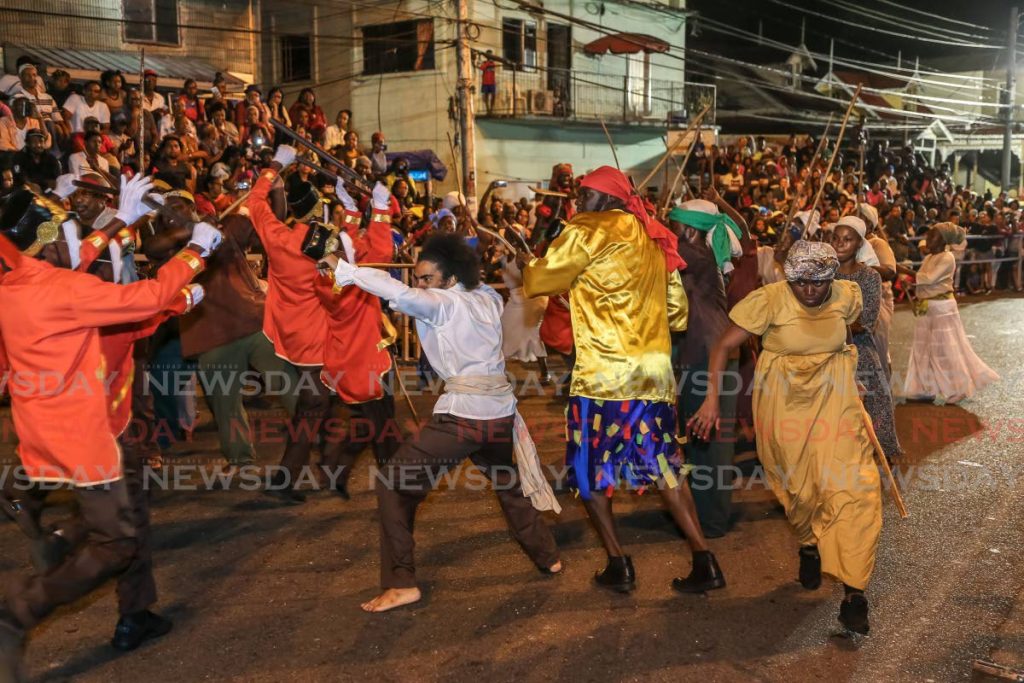  Canboulay re-enactment on February 21, 2020,  on Piccaddily 
Street, Port of Spain. - 