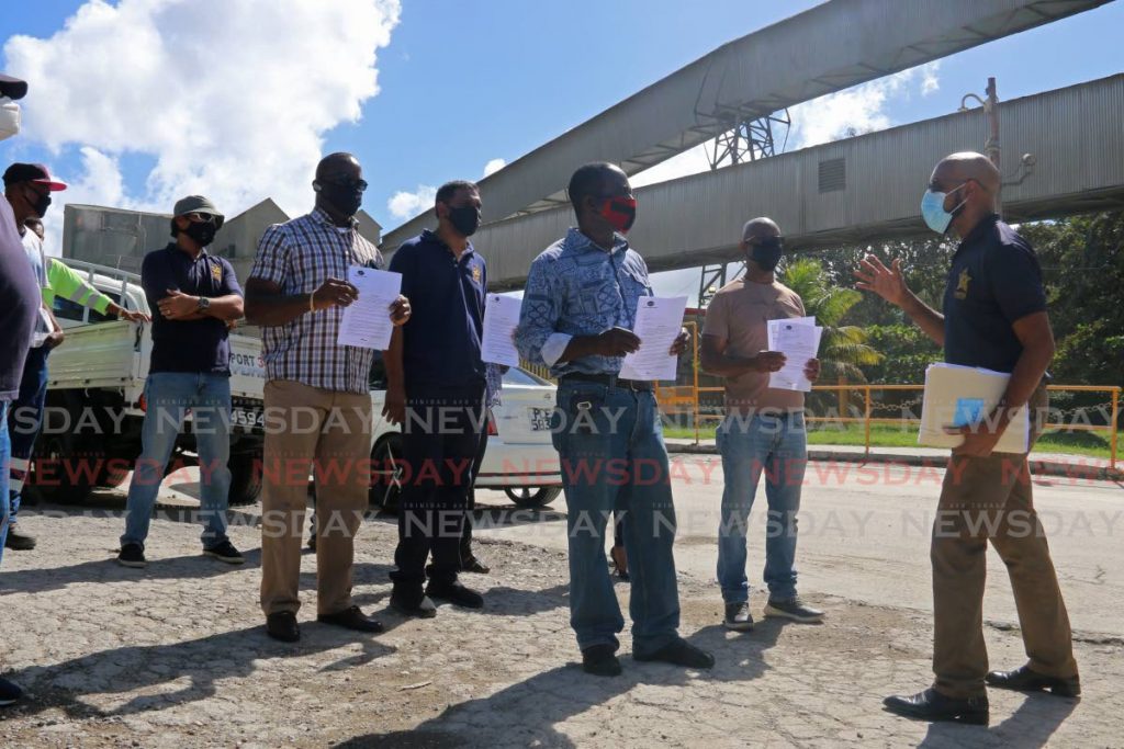 Oilfield Workers' Trade Union (OWTU) chief labour relations officer Lindon Mendoza meets with employees listed to be retrenched at TCL's packaging plant in Claxton Bay, Trinidad on January 31, 2021. Photo by Marvin Hamilton - 