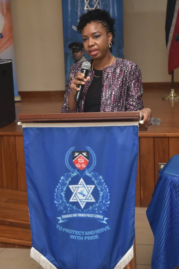 Aisha Corbie, manager of the Victim and Witness Support Unit of the TTPS speaking at the Who’s Writing Your Story – Victim to Victor workshop for young men at the Beetham Gardens Community Centre on February 11. PHOTO COURTESY THE TTPS - 