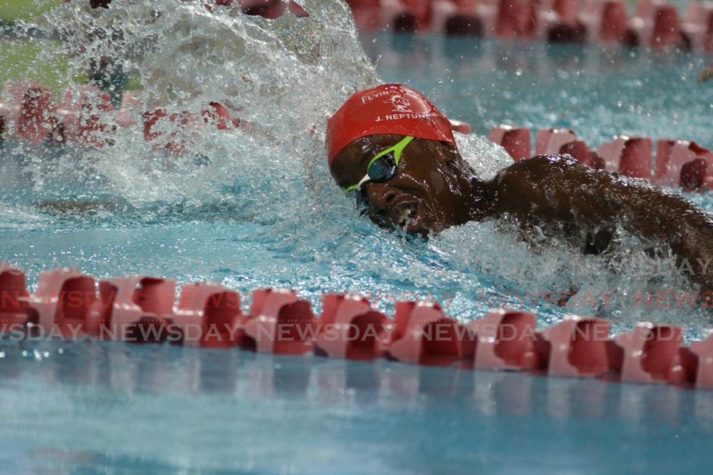 Jamal Neptune participates in the 100m freestyle on Friday at the National Age Group Long Course Championships at the National Aquatic Centre, Couva.  - Marvin Hamilton