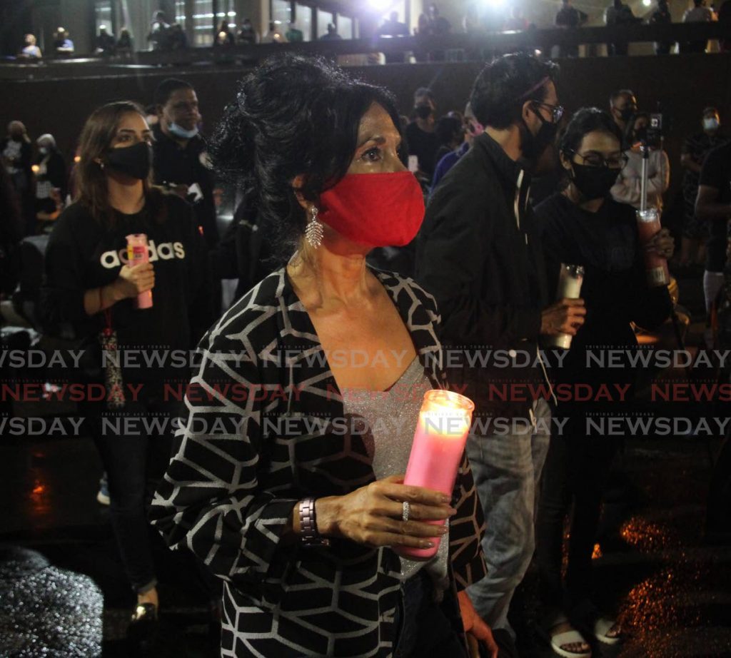 In this file photo, protesters for justice for women take part in a vigil at Woodford Square, opposite the Hall of Justice, Port of Spain. - 