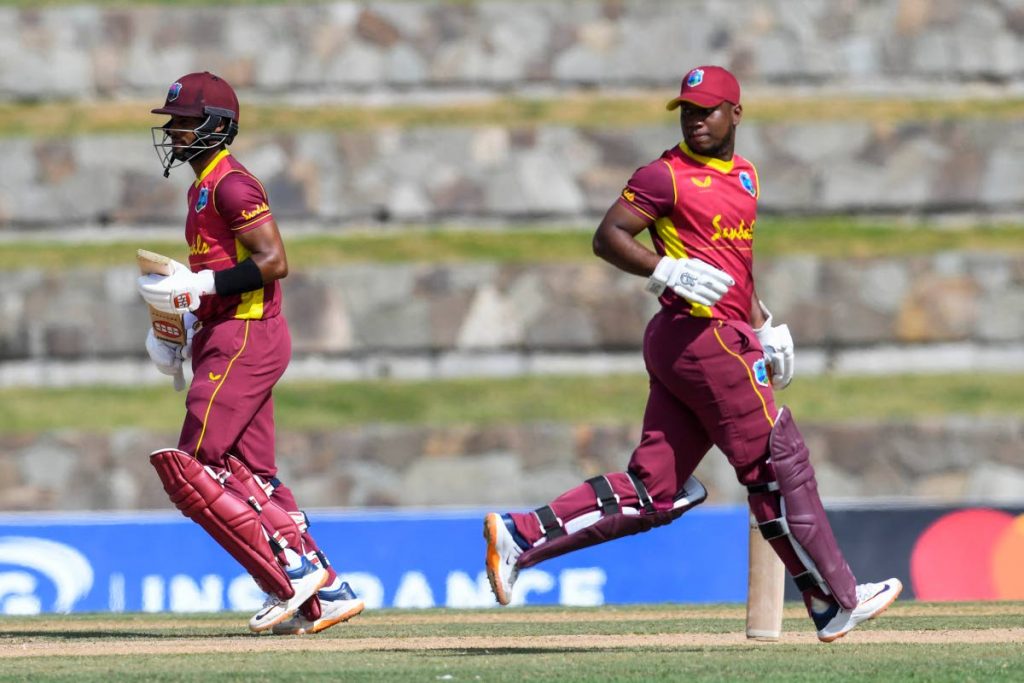 West Indies openers Shai Hope (left) and Evin Lewis during their opening run stand of 192 during the 2nd One-Day International match between West Indies and Sri Lanka at the Sir Vivian Richards Cricket Stadium in North Sound, Antigua, on Friday. (AFP PHOTO) 