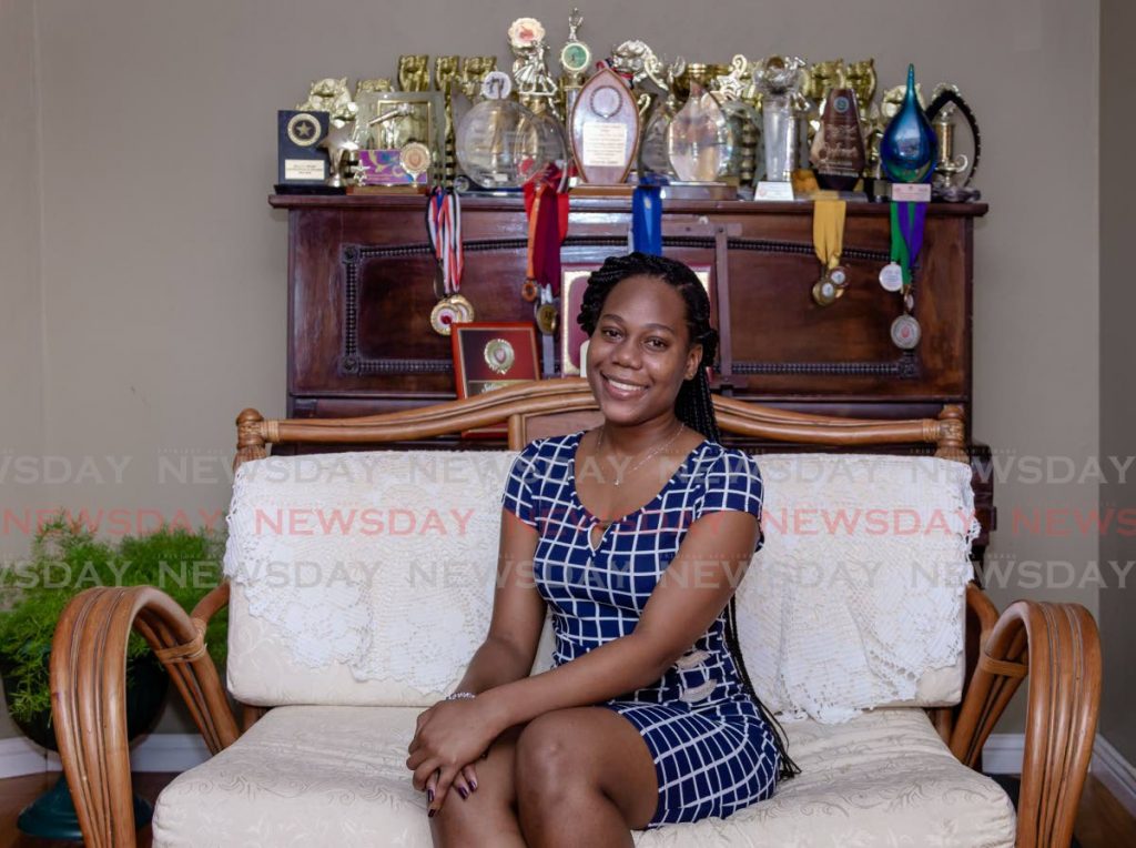 Scholarship winner Treverra James at her home in Signal Hill on Friday. - DAVID REID 