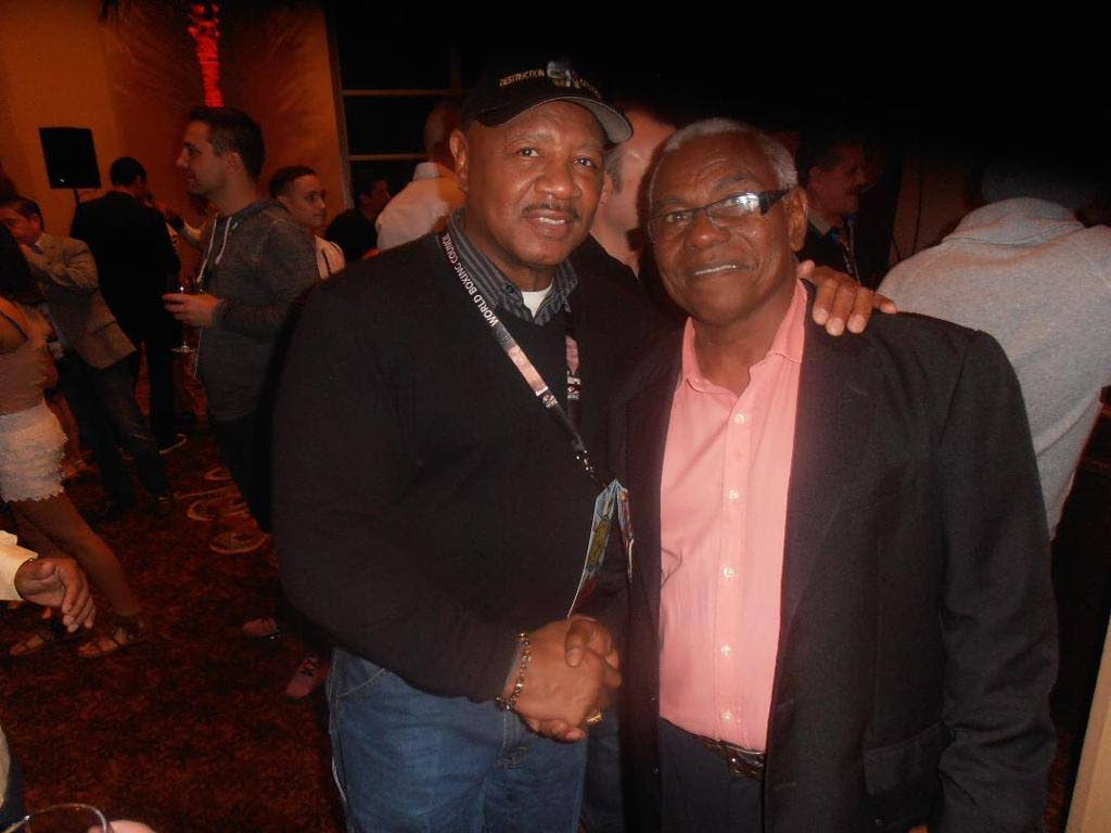 Buxo Potts, right, with former middleweight boxing champion Marvin Hagler at the 2016 World Boxing Council Convention in Florida, USA.