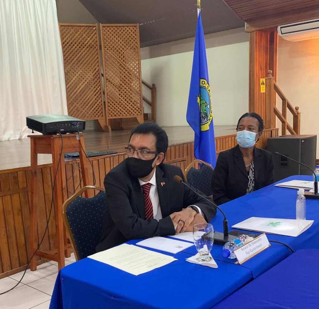 Minister of Rural Development and Local Government Kazim Hosein and permanent secretary Desdra Bascombe.  - 