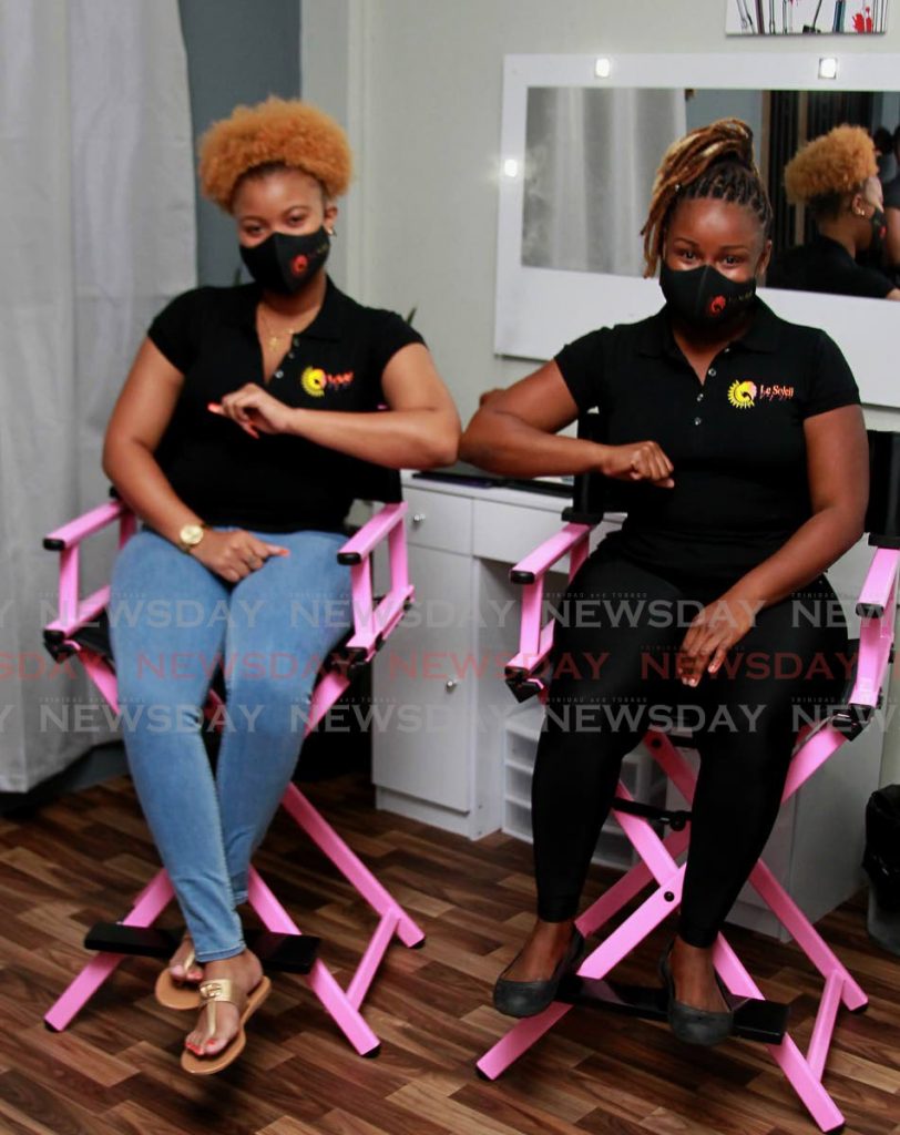 D'vonne Dolly, owner of Le Soleil Day Spa, with hair stylist and business associate Trelease Jordan. The spa was recently opened on Faroe Terrace in San Juan.
 - Photo by Roger Jacob 