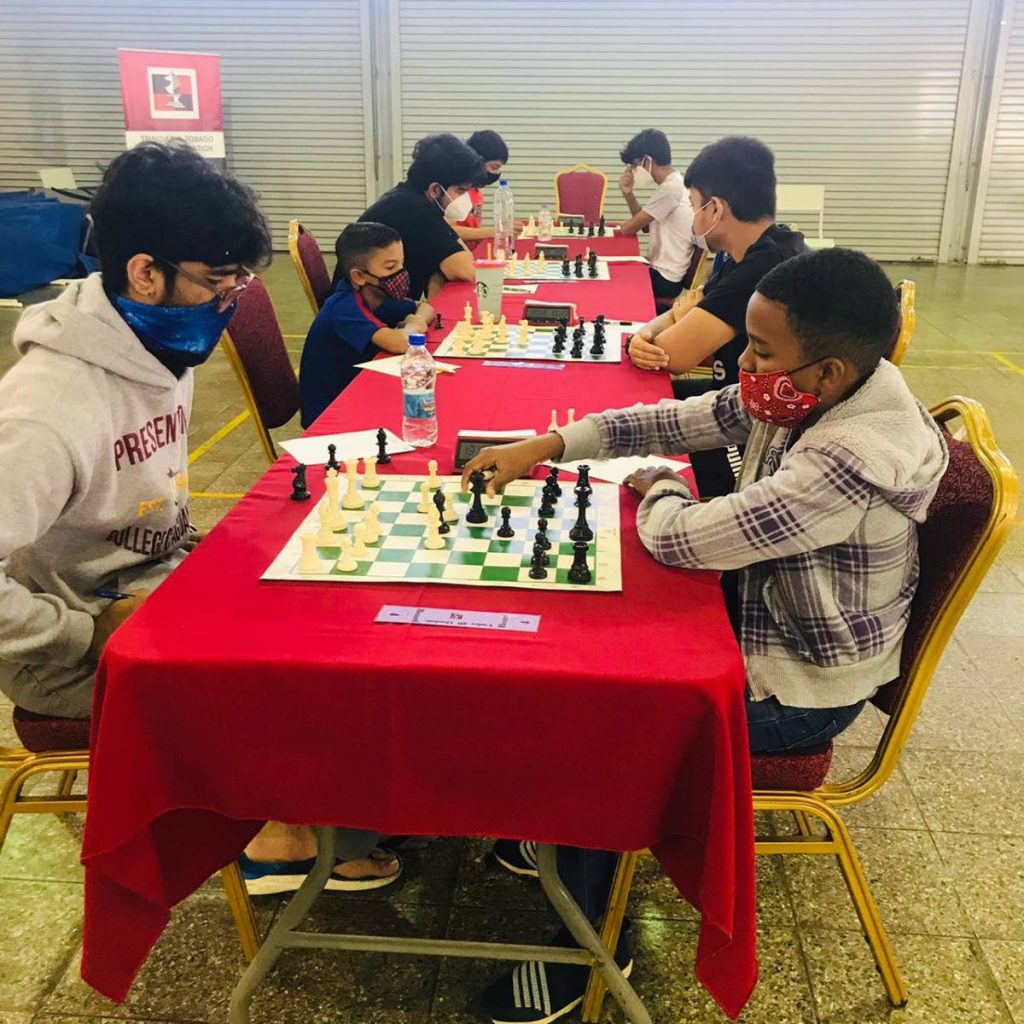 Players in action at the National Junior Chess Championships at Preysal Secondary School over the weekend.  - Photo courtesy TT Chess Association