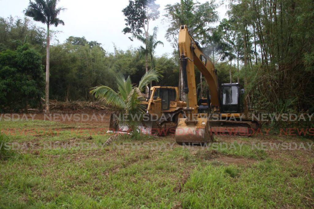 An excavator and grader at the site where land was cleared off Tucker Valley Road for a new carpark for visitors. - Sureash Cholai