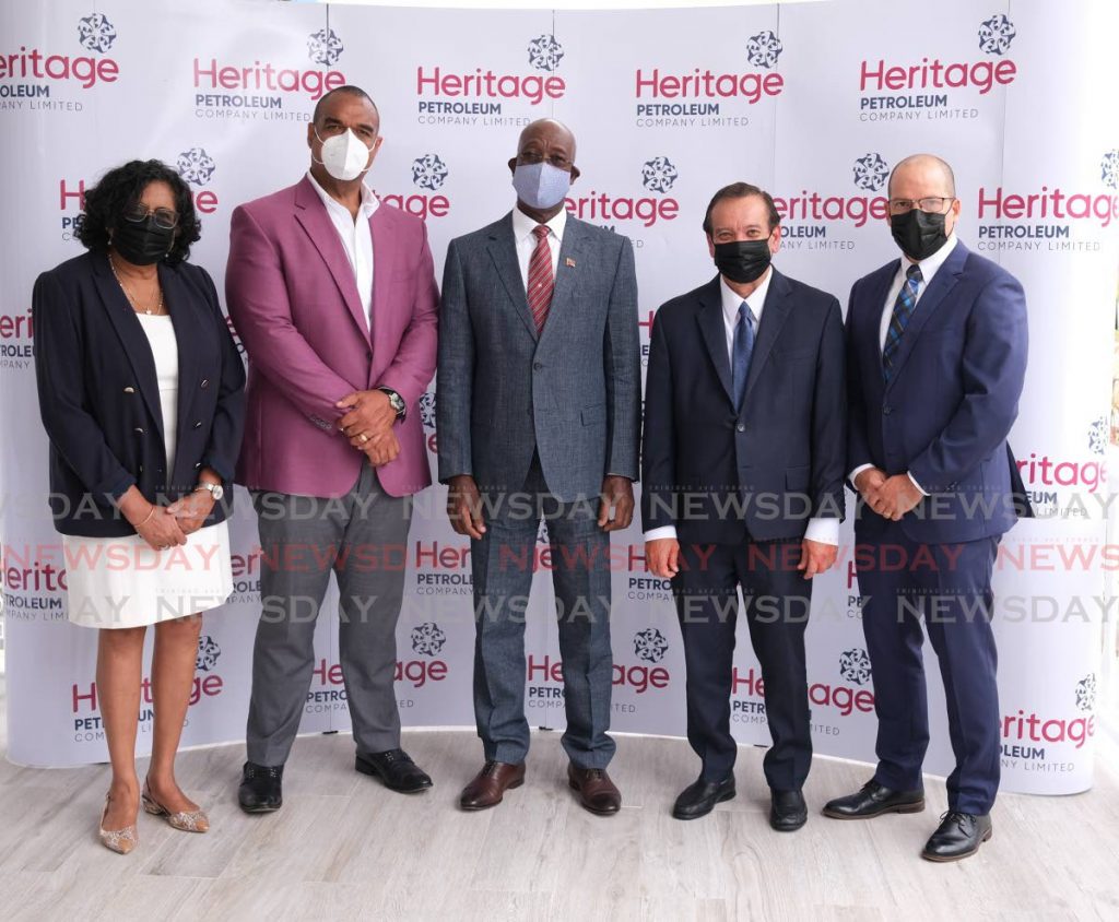 From left: Heritage Petroleum Ltd CEO Arlene Chow, chairman Michael Quamina, Prime Minister Dr Keith Rowley, Energy Minister Franklin Khan and EOG Resources Trinidad Ltd managing director George Vieira at a signing ceremony for an exploration deal between EOG and Heritage at Heritage's offices in Port of Spain on Wednesday. PHOTO COURTESY OPM - 