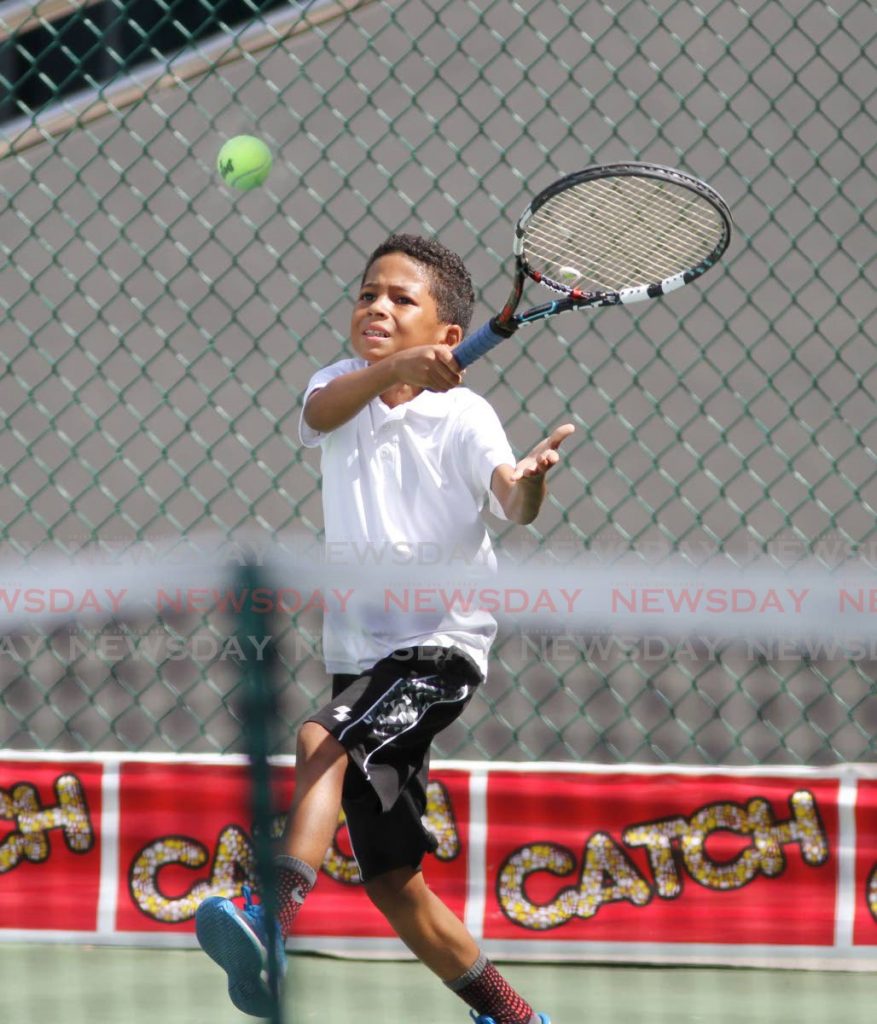 In this April 1, 2018 file photo, Jarryd John hits a return during action in the Catch Junior Tennis Championships, at the Nelson Mandela Puiblic Courts, Port of Spain. The 2021 edition of the tournament, which was due to begin on Saturday has been postponed until Monday.  - CHOLAI