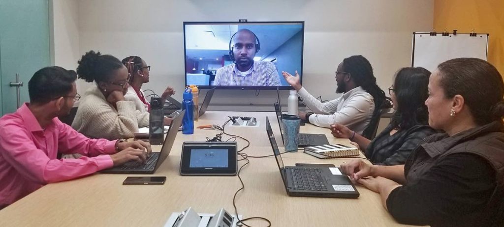 
Members of the PwC Trinidad and Tobago team use conference technology to communicate with clients and partners in 2019. In a PwC survey technology firms had a positive outlook for the next 12 months. - 
