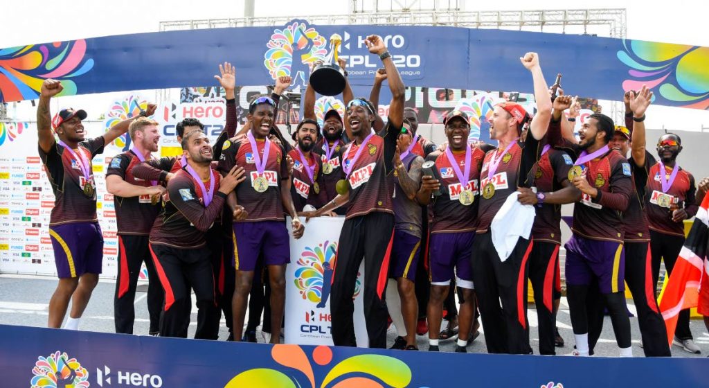 In this September 10, 2020 file photo, Trinbago Knight Riders celebrate winning the Hero Caribbean Premier League Final against St Lucia Zouks at the Brian Lara Cricket Academy in Tarouba. (Photo by CPL T20 via Getty Images)  