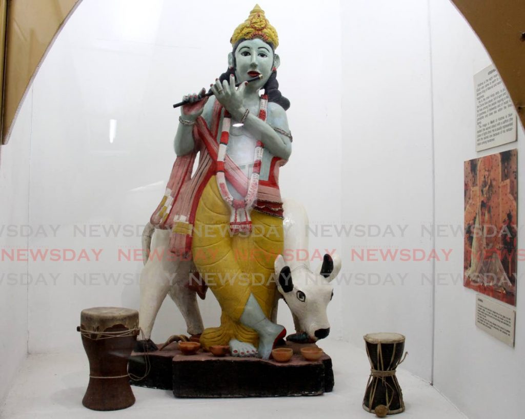 Krishna, the Hindu god, inspires goodness, fellowship and responsibility. This murti is on display at the National Museum in Port of Spain. - Photo by Ayanna Kinsale