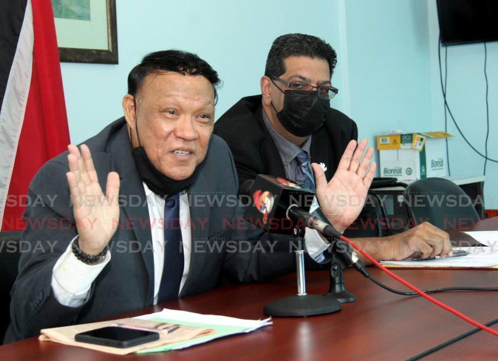 Oppostion MP for Pointe-a-Pierre David Lee speaks during a press conference at the Office of the Opposition Leader on Charles Street, Port of Spain, as Mayaro MP Rushton Paray looks on Sunday. - Ayanna Kinsale