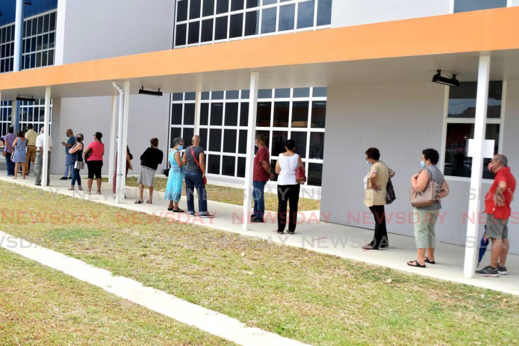 People line-up at the Diego Martin Health Centre to be vaccinated. Photo by Vidya Thurab