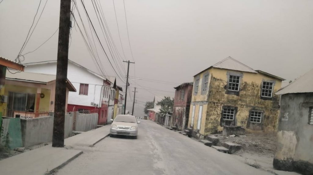 The town of Chateaubelair, which is in the red zone near the La Soufriere volcano in St Vincent, is covered in ash after the first eruption on Friday. - PHOTO COURTESY CLARE KEIZER OF THE SEARCHLIGHT NEWSPAPER