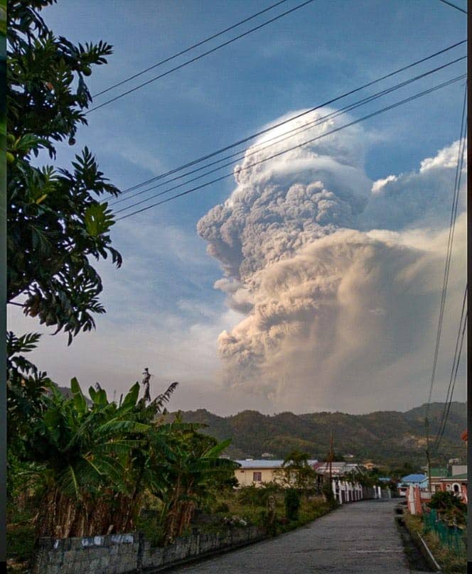 A cloud of ash covers parts of the sky at Layou, St Vincent and the Grenadines. - 