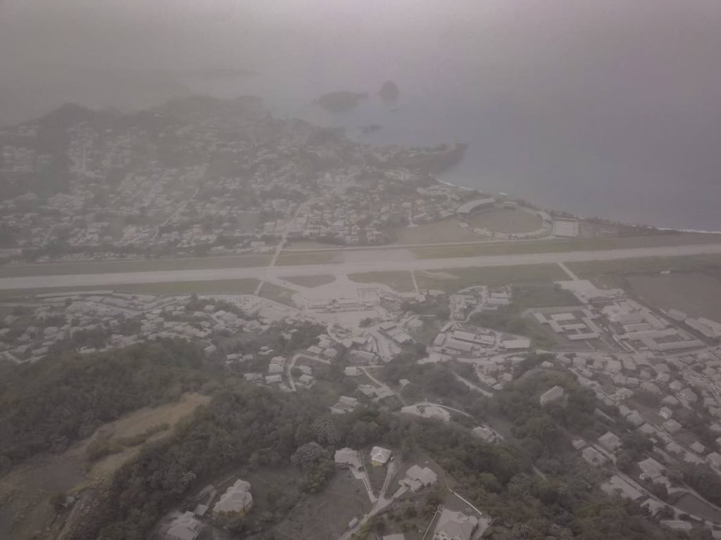 An aerial photo shows Arnos Vale, St Vincent covered in volcanic ash from La Soufriere. Photo courtesy Virad Peters. - 