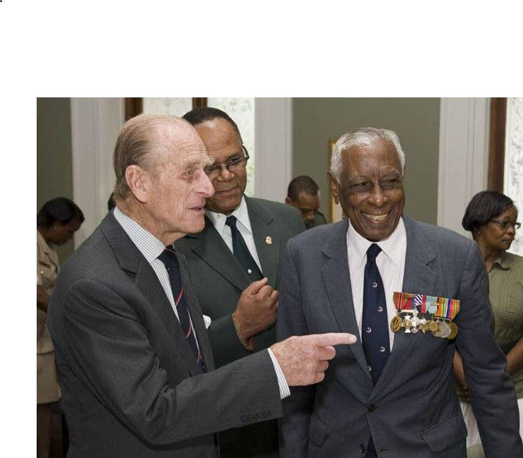 Prince Philip with RAFA members Ulric Cross, right, and retired Col Salandy during the prince's visit in 2012 to Trinidad and Tobago -Photo courtesy RAFA