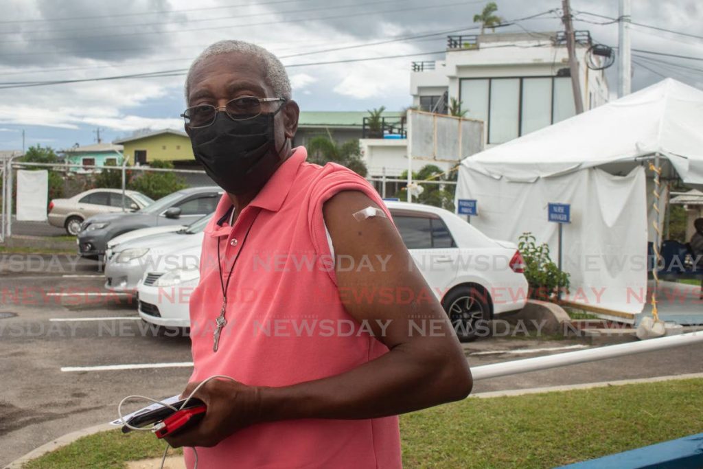 Wilfred Haper has a small bandage on his arm on the spot where he received a covis19 vaccine at the La Romaine Health Centre on April 10. - PHOTO BY CHEQUANA WHEELER