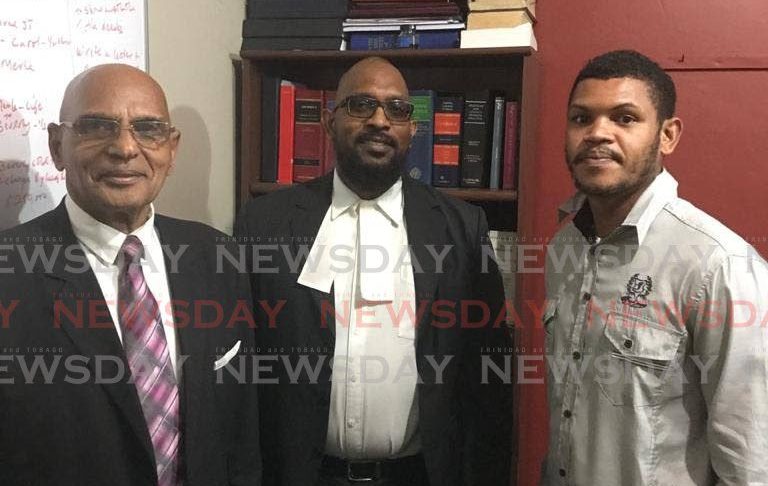 Sangre Grande gardener Avian Remy, right, and his attorneys Reynold Waldrop, left, and Tim Charriandy. - 