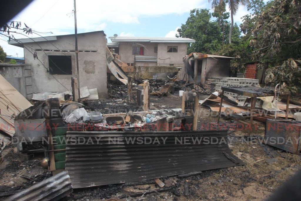  The site of a fire on Sunday afternoon at Pt Do'r road, La Brea, which left three people were left homeless. - Lincoln Holder