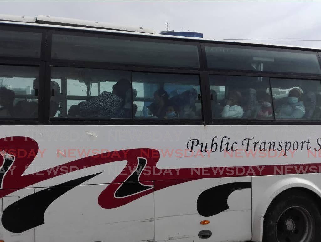  TT citizens and Vincentians heading to quarantine on a PTSC bus at the Port of Port of Spain on Thursday after arriving from St Vincent. - Stephon Nicholas