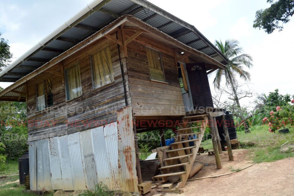 The home of Utilda Joseph where her body was found on Saturday night at Hillview Lane extension, Quarry Village, Siparia, on Sunday afternoon. Photo by Vidya Thurab