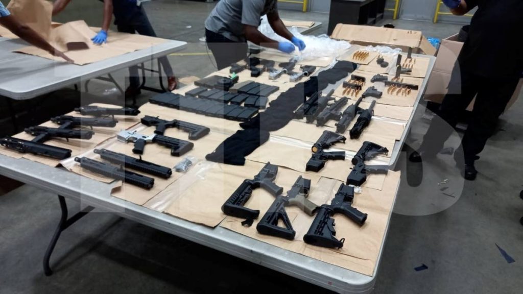 File photo of guns found inside Bond package at Piarco Airport  - TTPS