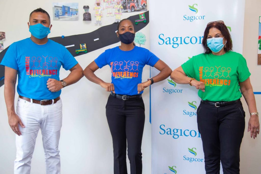 Brian Dookeran, left, an agency manager in Sagicor’s San Fernando office; Dr Shara Zoe, principal of the LIFE Centre; and agency manager Jennifer Khan from the Camille Sinanan branch pose for a photo at the cheque handover held at the centre’s premises in Cascade. - PHOTO COURTESY SAGICOR