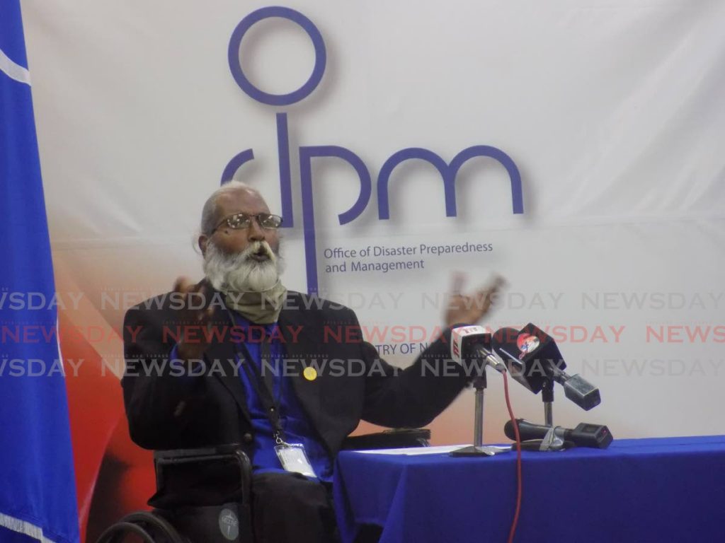 File photo of former Regional coordinator for the Office of Disaster Preparedness and Management (ODPM) Jaishima Gowandan in front of an OPDM logo. - File photo