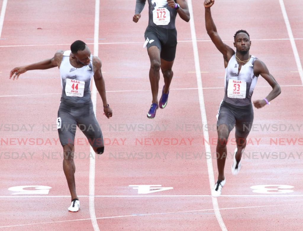 FILE PHOTO: Jereem Richards, right, celebrates after crossing the line first in the men's 200m race at the 2019 NGC NAAA Open Championships at Hasely Crawford Stadium in Port of Spain. Kyle Greaux is on the left. PHOTO BY ANGELO MARCELLE - Angelo Marcelle