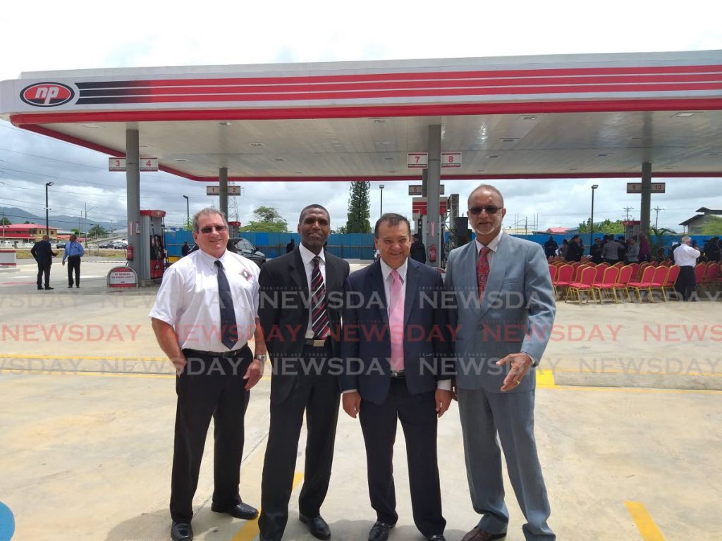  General manager Michael Baiz, from left, NP CEO Bernard Mitchell, Energy Minister Franklin Khan and NP chairman Sahid Hosein at the opening of NP's service station in El Socorro on September 25, 2019. Photo by Tyrell Gittens - 