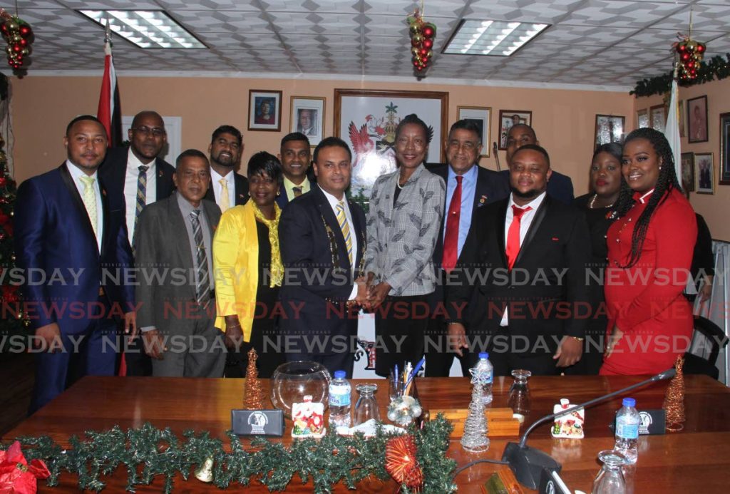 Sangre Grande Regional Corporation chairman Anil Juteram and members of the council, along with permanent secretary of the Ministry of Rural Development and Local Government Desdra Bascombe, centre, at the swearing-in ceremony on December 17, 2019. File photo - 