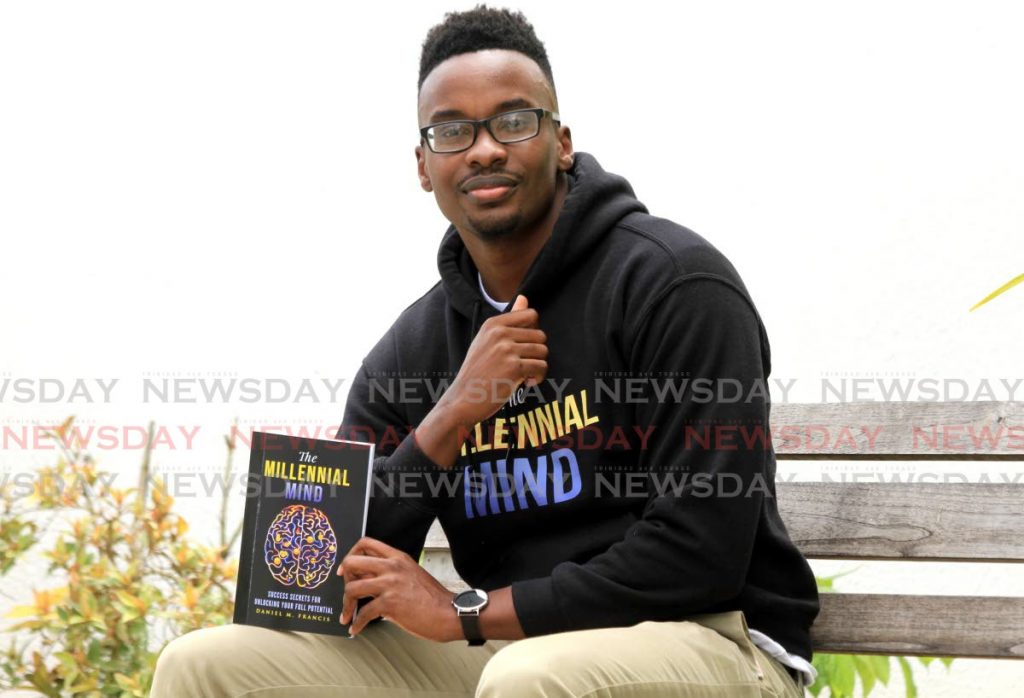 Daniel Francis with his first book The Millennial Mind. The entrepreneur and author is documenting what it is like for local millennials through his books The Millennial Mind and the Millennial Experience. 