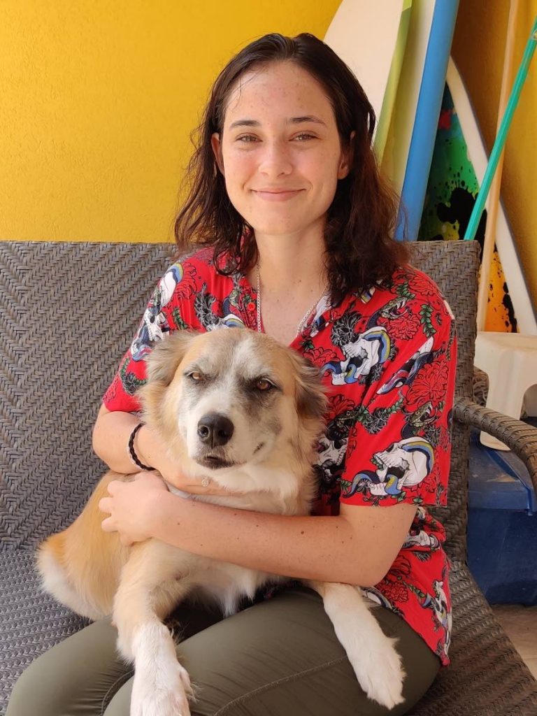  Zoë Lowden-Blaber and her dog Buddy. 