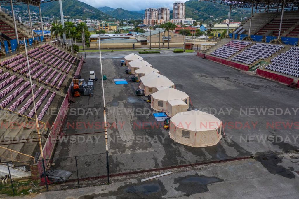 GETTING READY: Field Hospitals erected at the Jean Pierre Sports Complex in Port of Spain as the Ministry of Health gets ready in case the parallel health system becomes overwhelmed by covid19 cases. PHOTO BY JEFF MAYERS - 