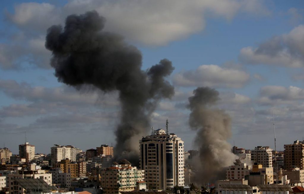 An Israeli air strike hits a building in Gaza City. AP PHOTO - Hatem Moussa
