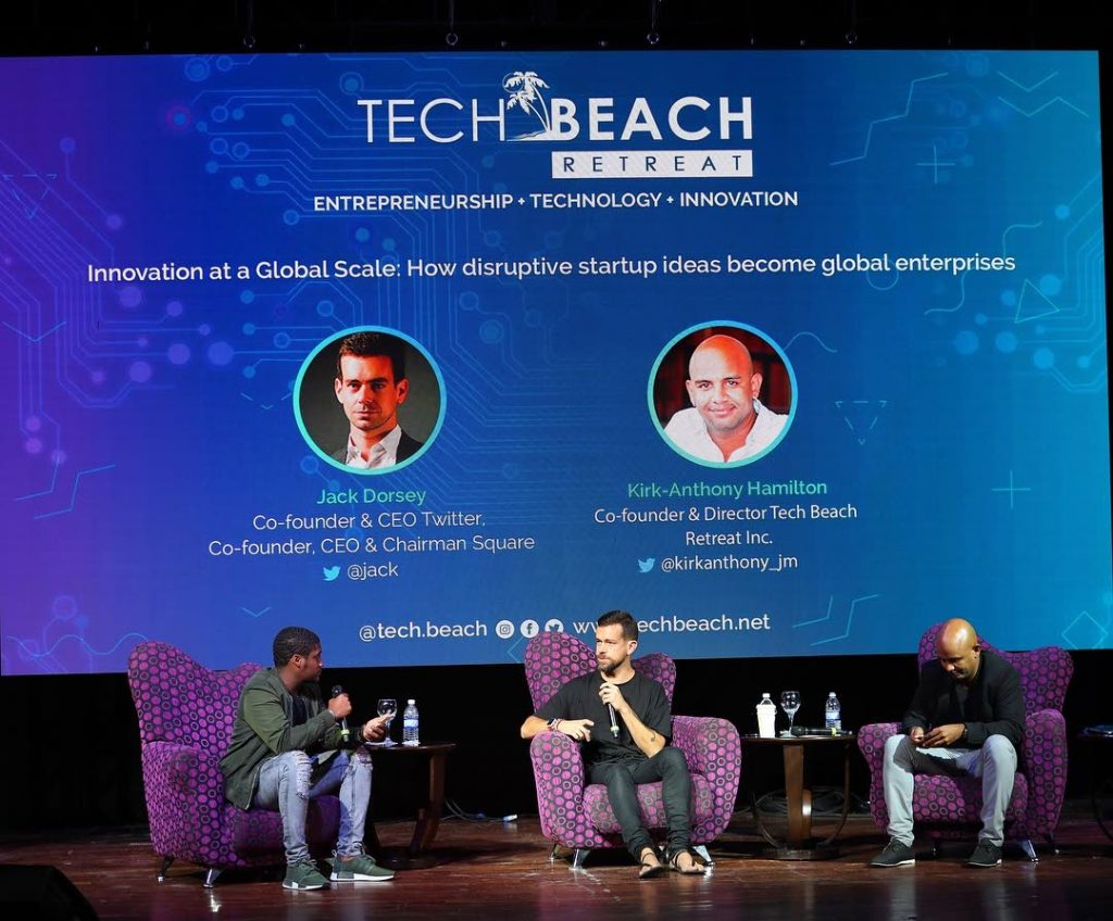 In this file photo, Tech Beach co-founders Kyle Maloney (left) and Kirk-Anthony Hamilton (right) chat with Twitter CEO Jack Dorsey. - 