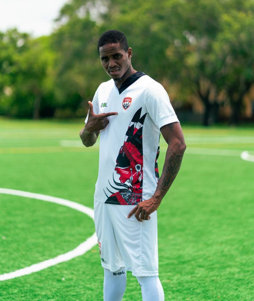 National footballer Joevin Jones dons one of the new Trinidad and Tobago kits made by BOL.  - TTFA