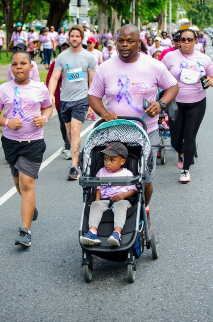 Supporters participate in Walk for the Cure cancer fundraiser in 2019. - 