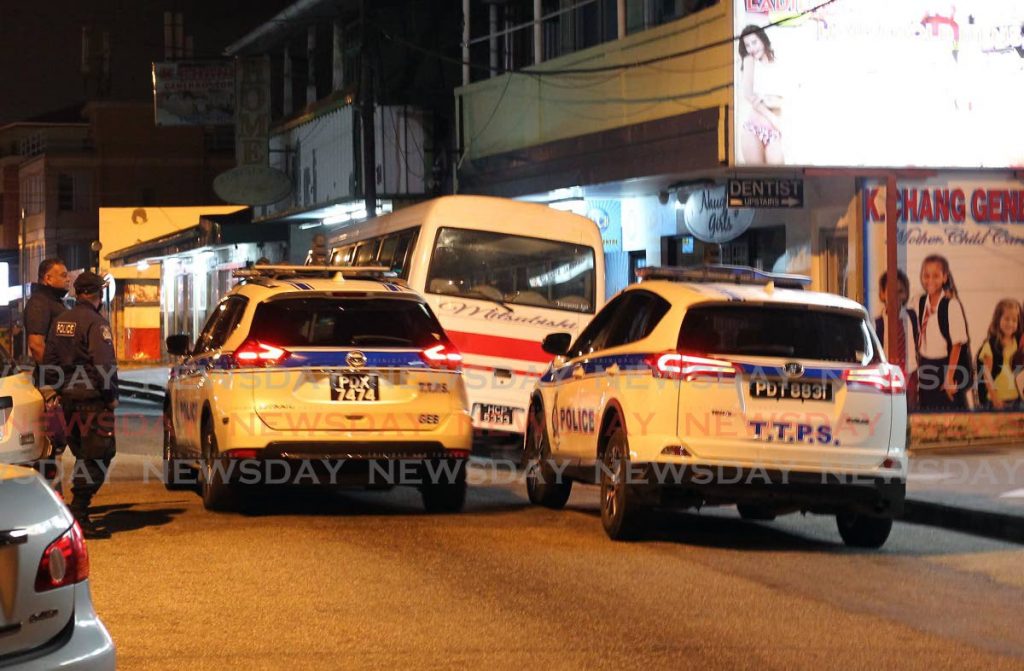 FILE PHOTO: Police on patrol in Arima on Sunday night. - 