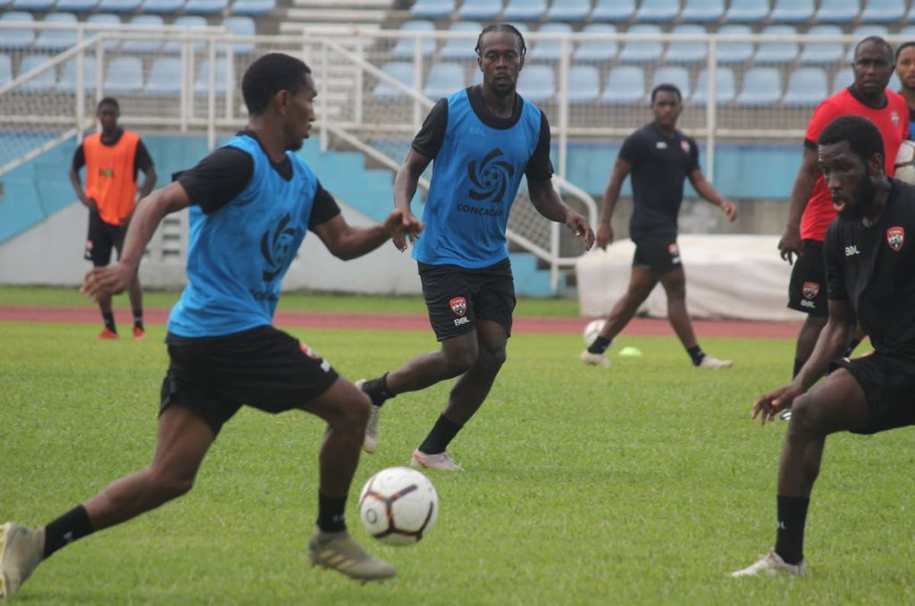 Players take part in a scrimmage at the Ato Boldon Stadium in Couva on  Sunday as new national men's team coach Angus Eve held his first training session.  - TTFA Media